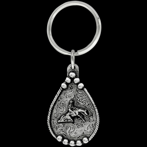 Reining Horse Keychain, The Reining Horse keychain includes a beautiful rope border, a 3D reining horse and rider figure, and a key ring attachment. Each silver key chain is built